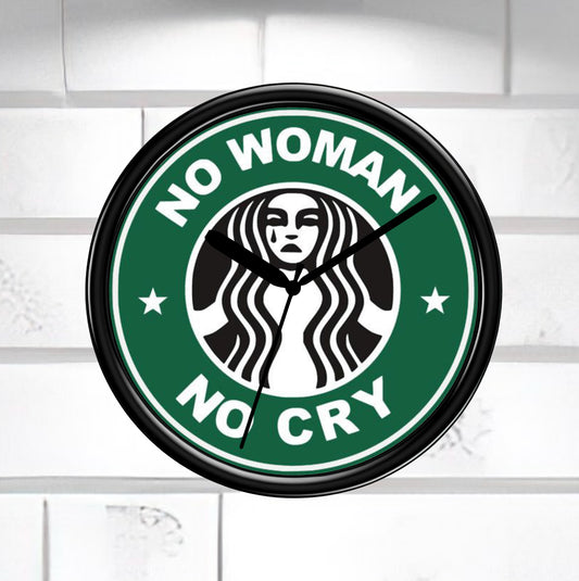 Wall clock with 'No Woman No Cry' design on a white background