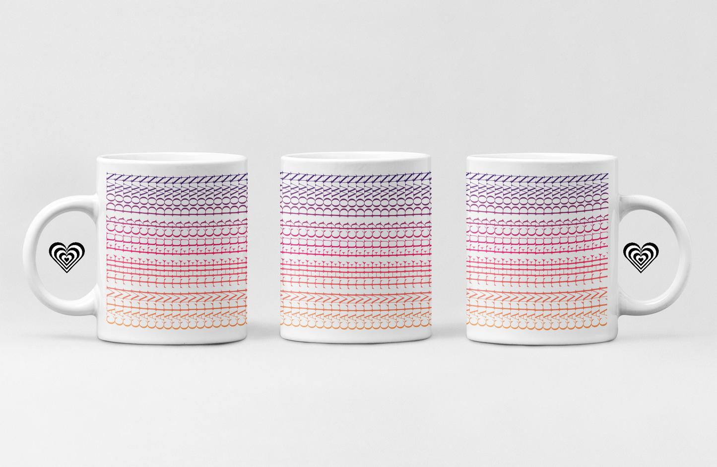 Three mugs with a patterned design and heart symbols on a white background