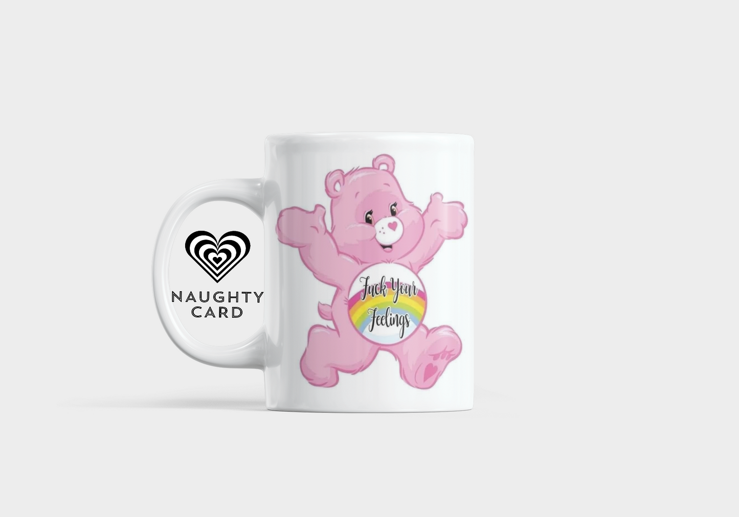 Mug with pink bear design and text "f*ck your feelings" on a white background