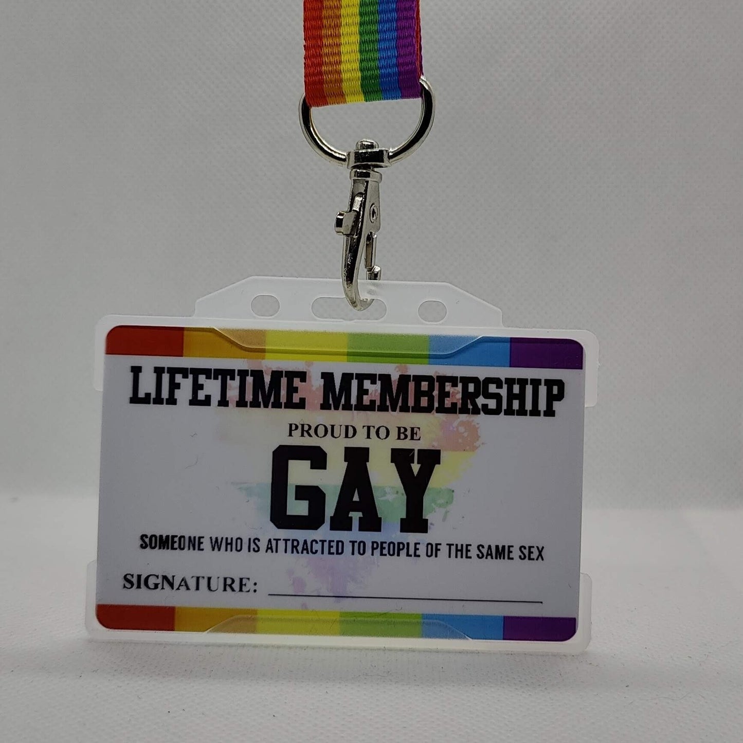 Lifetime Gay Membership Card with a LGBT lanyard on a plain white background