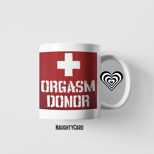 Mug with 'Orgasm Donor' text and symbols on a white background