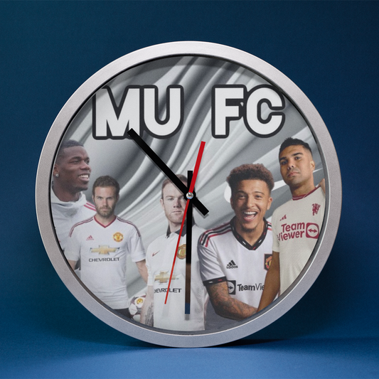 Wall clock with Man U FC logo and player images on a blue background