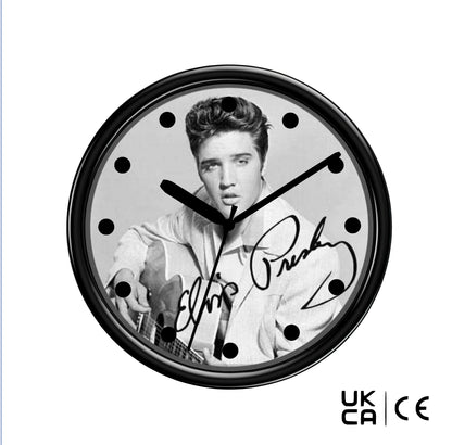 Wall clock with a black and white photo of Elvis and signature on a white background.
