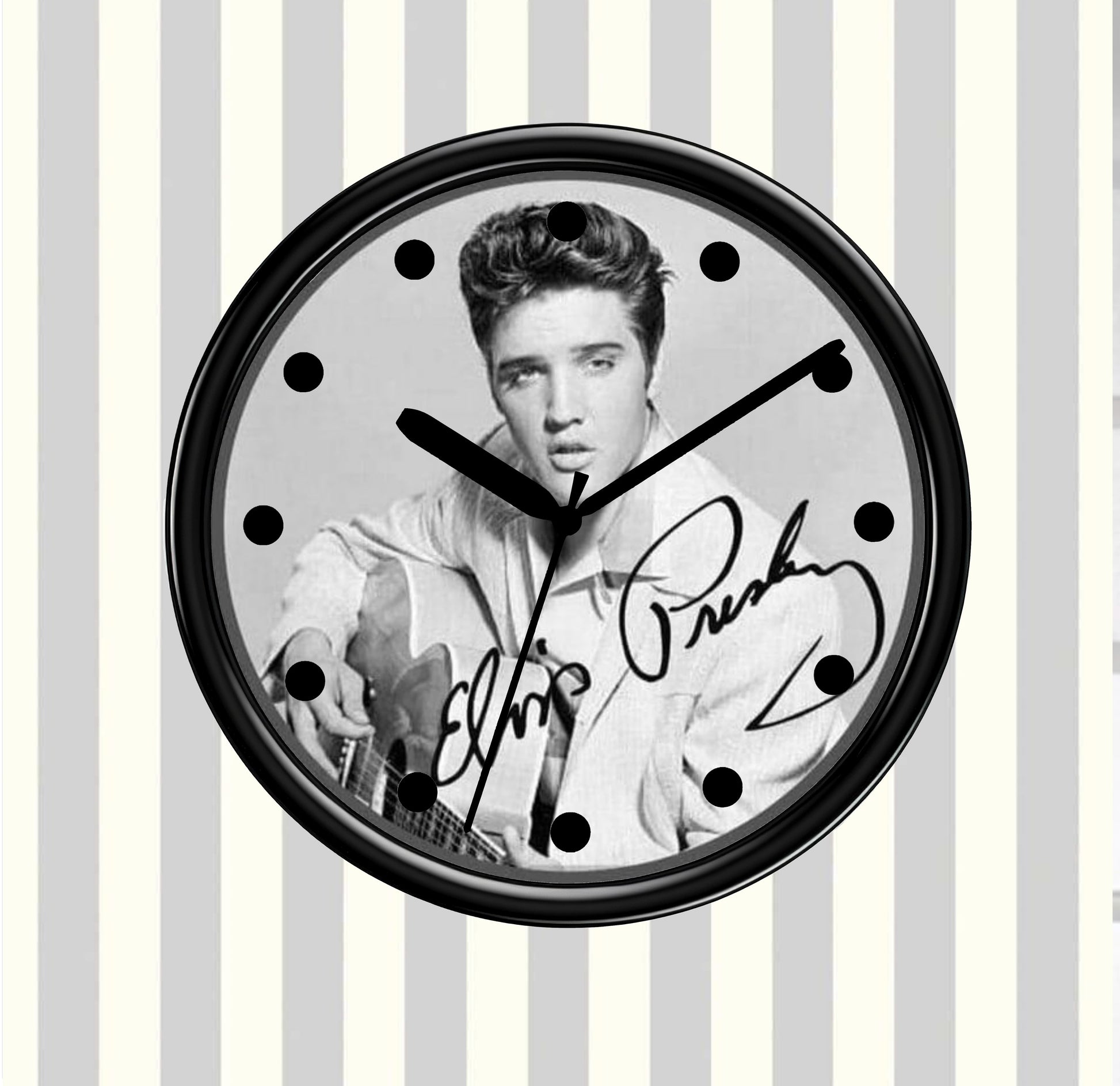 Wall clock with a black and white photo of Elvis Presley on a striped background