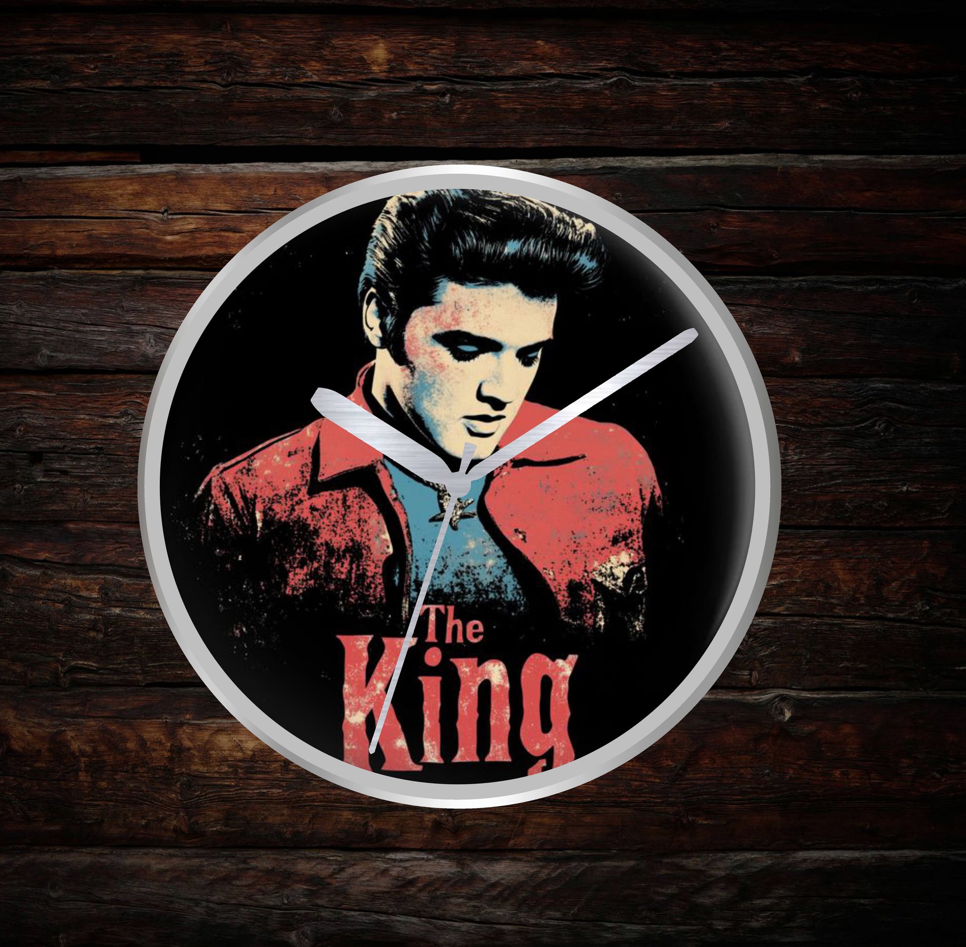 Silver Wall clock with a stylized portrait of a famous person and 'The King' text on a dark background.