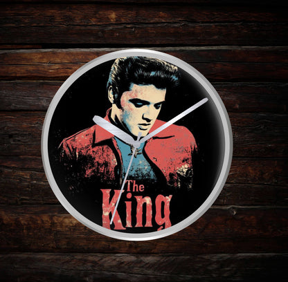 Silver Wall clock with a stylized portrait of a famous person and 'The King' text on a dark background.