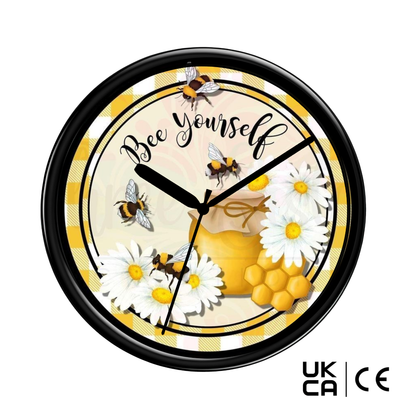 Wall clock with bee and daisy design, featuring the text 'Bee Yourself'.