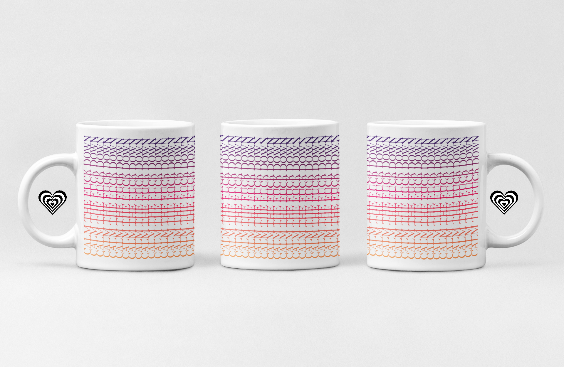 Three mugs with a patterned design and heart symbols on a white background