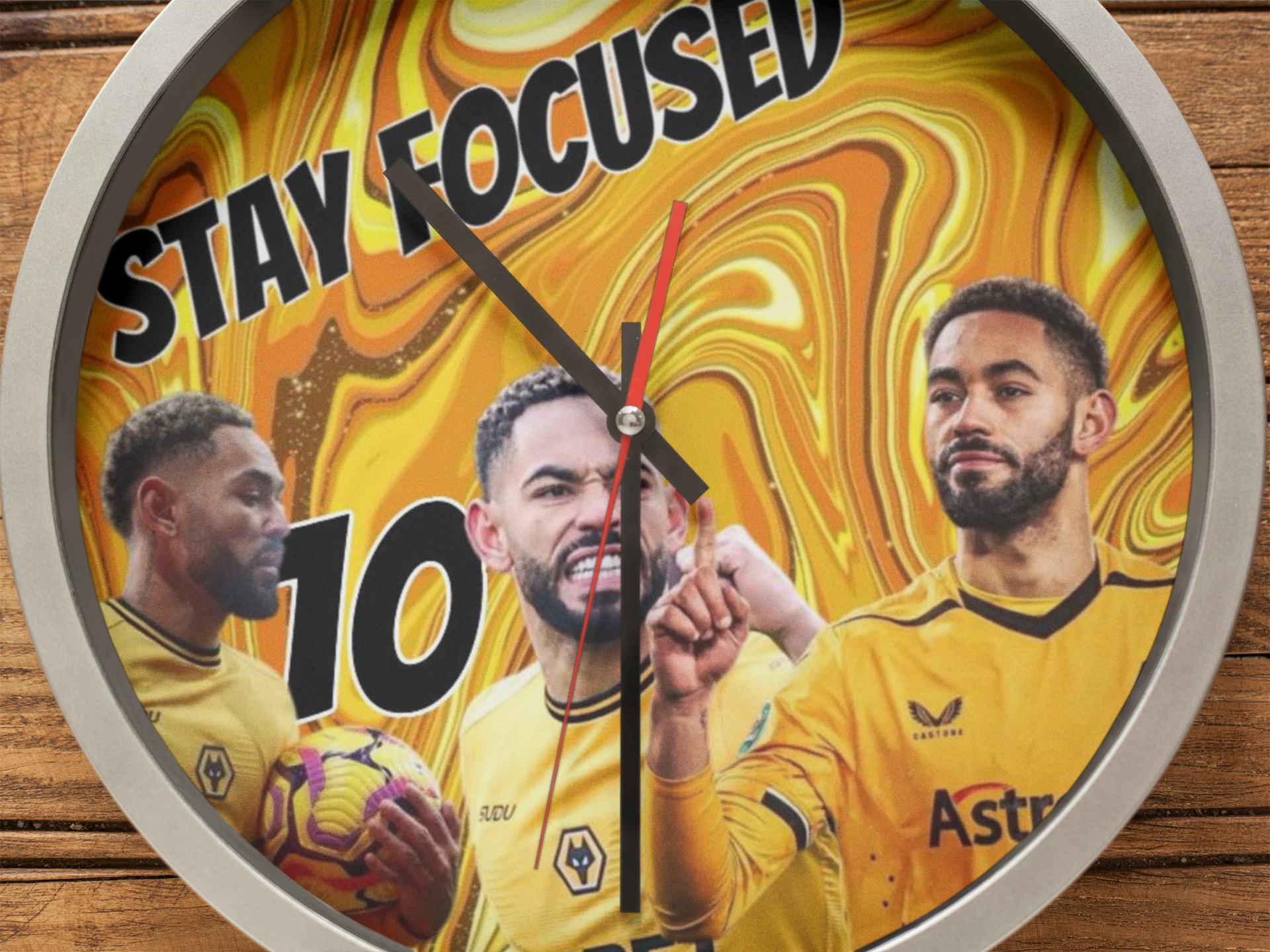 Matheus Cunha Metal Wall clock with sports-themed design featuring athletes and motivational text on a wooden background.