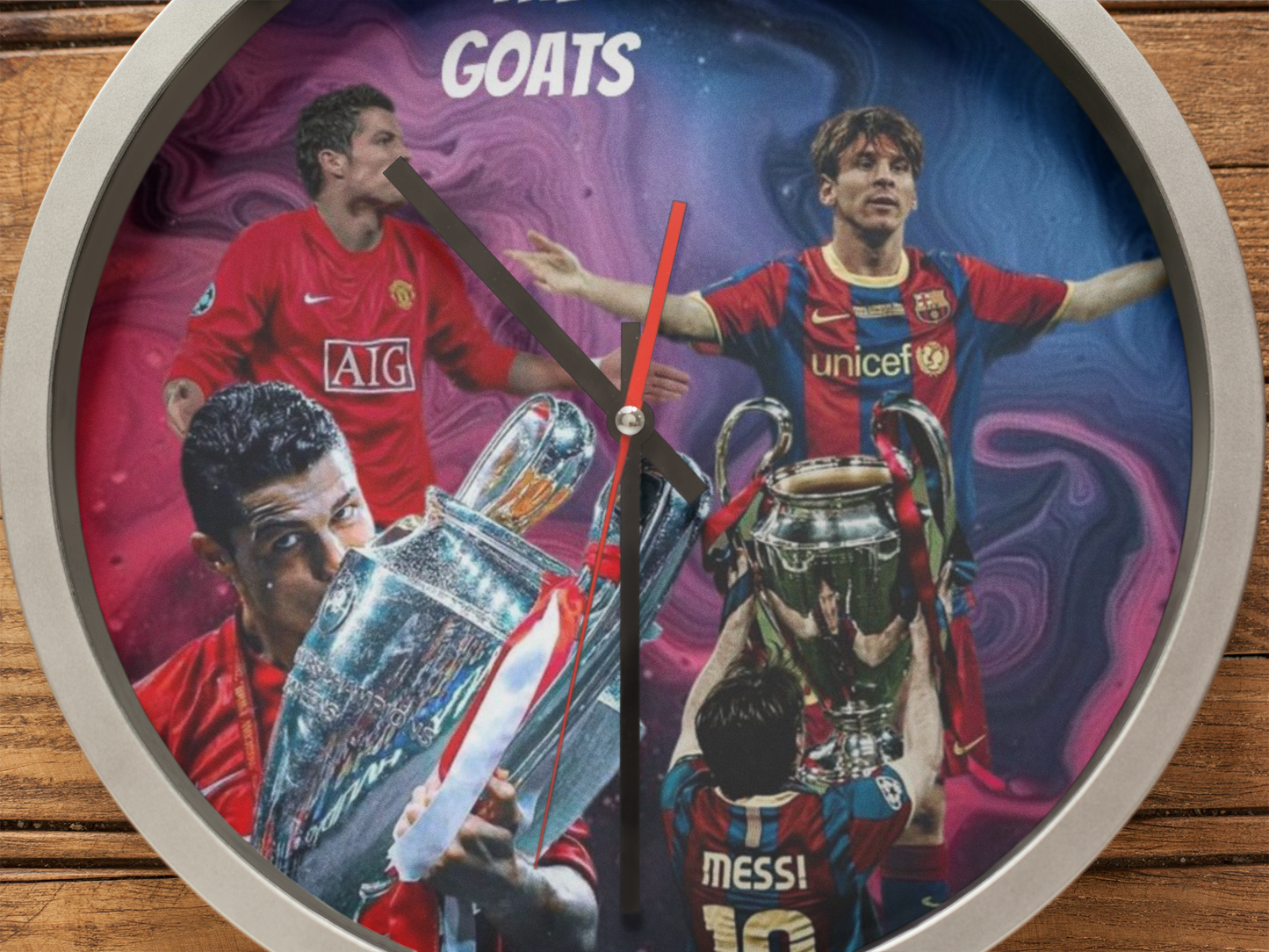 Wall clock with images of soccer players and trophies on a swirling background