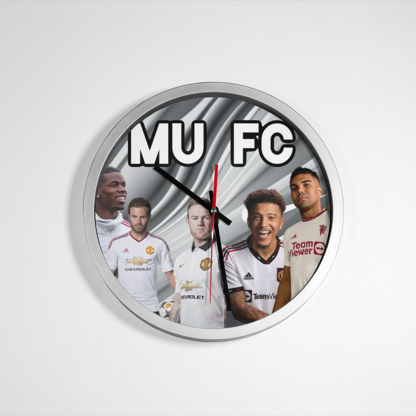 Wall clock with Manchester United FC logo and player images on a white background