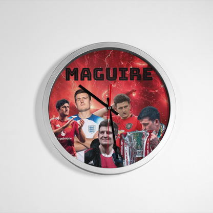 Wall clock with images of a soccer player Harry Maguire and the name 'Maguire' on a red background.