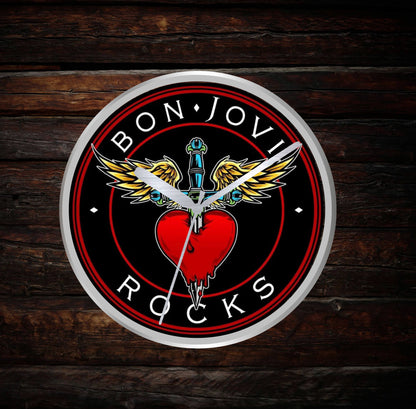 Wall clock with Bon Jovi logo on a wooden background